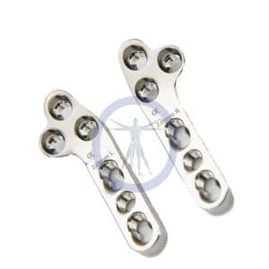 A pair of metal braces with two holes in them.