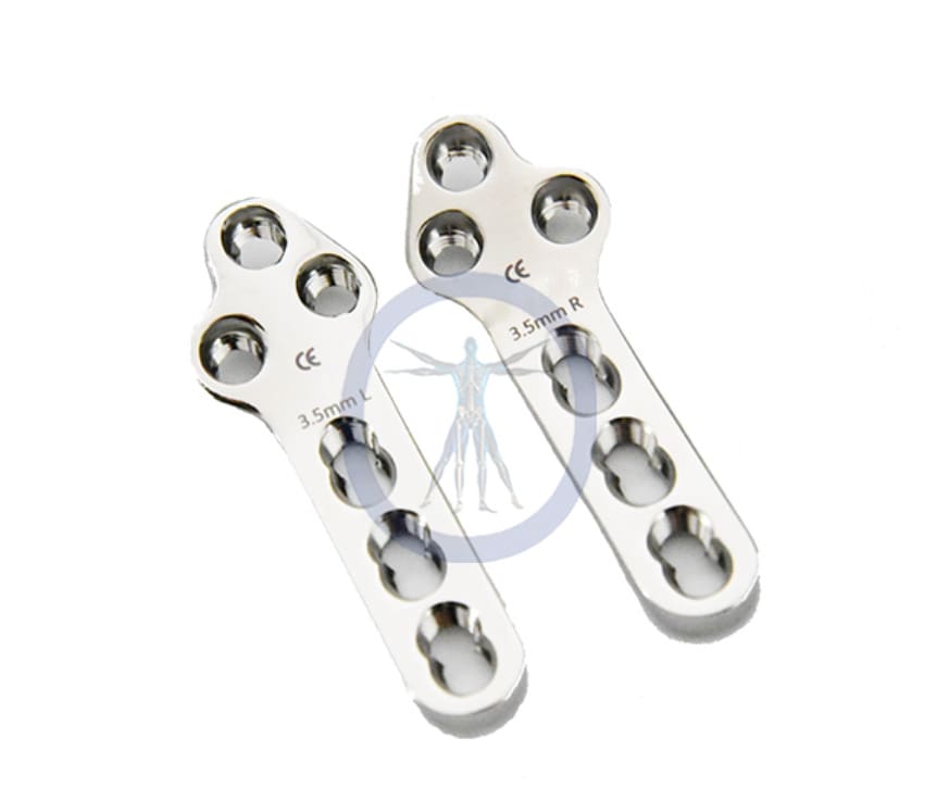 A pair of metal brackets with holes for the fingers.