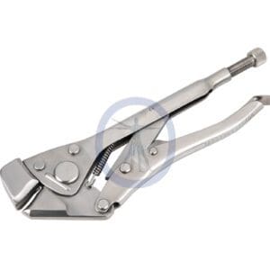 A pair of metal tools with a wrench on top.
