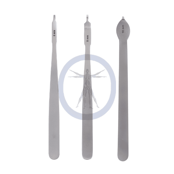 A set of three surgical instruments with the image of an arrow on them.