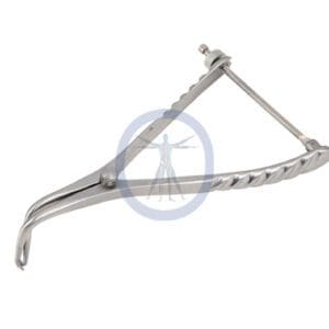 A metal instrument with a handle and a small hole in it.