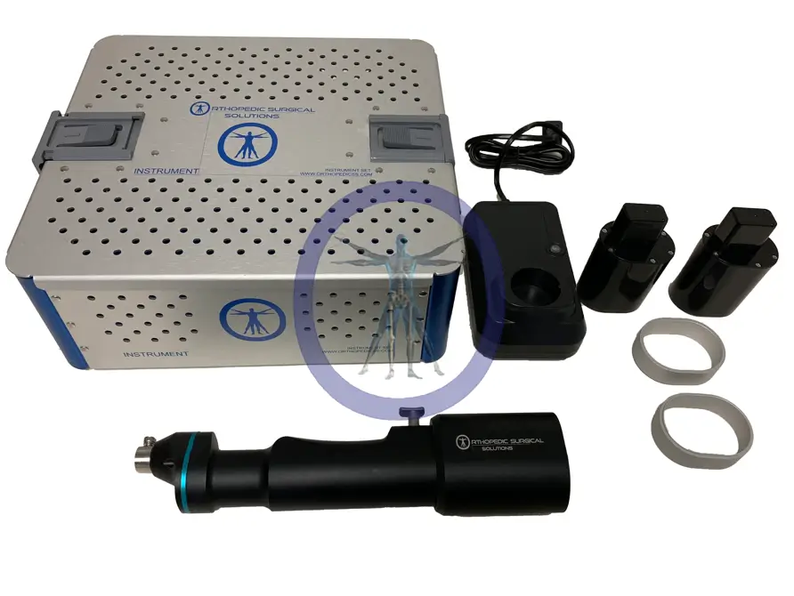 Black and silver surgical drill and accessories.