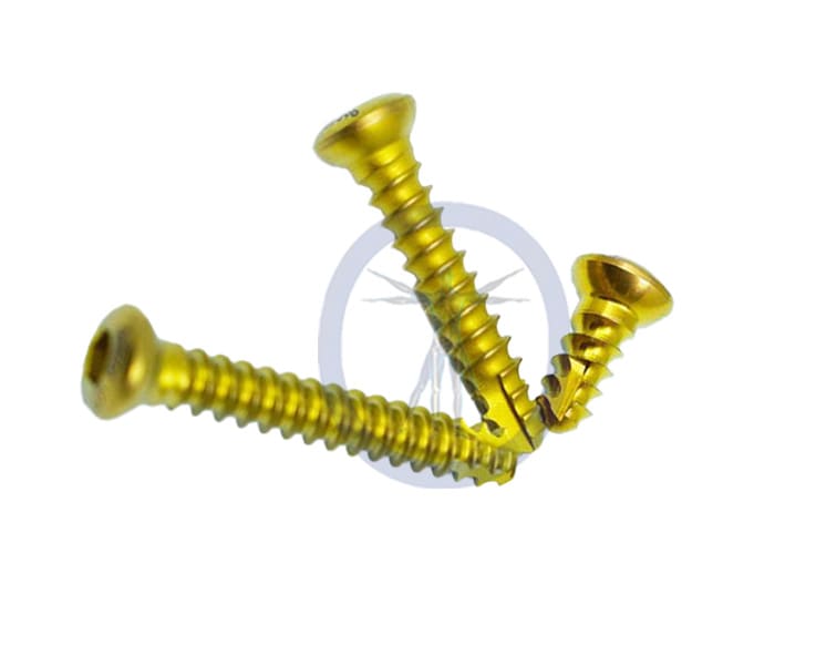 A group of three yellow screws that are sitting on top of each other.