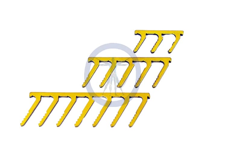 A set of four yellow handles for a tool.