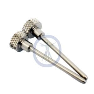 A pair of metal handles with a diamond pattern on them.