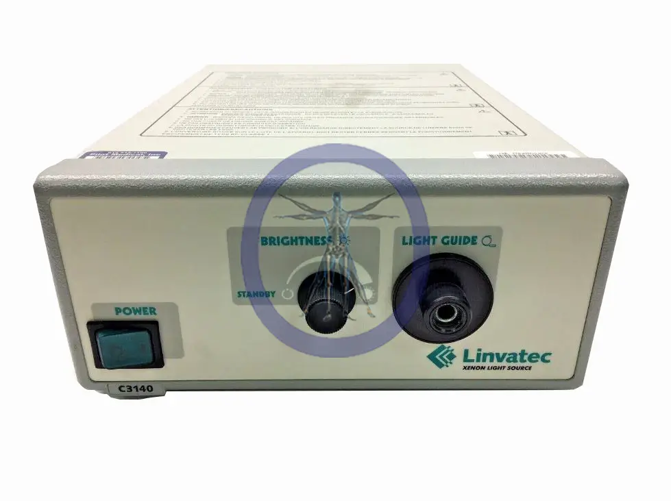 A Conmed/Linvatec C3140 Light Source machine, featuring a power button and controls for brightness and light guide, with a light guide cable connected.