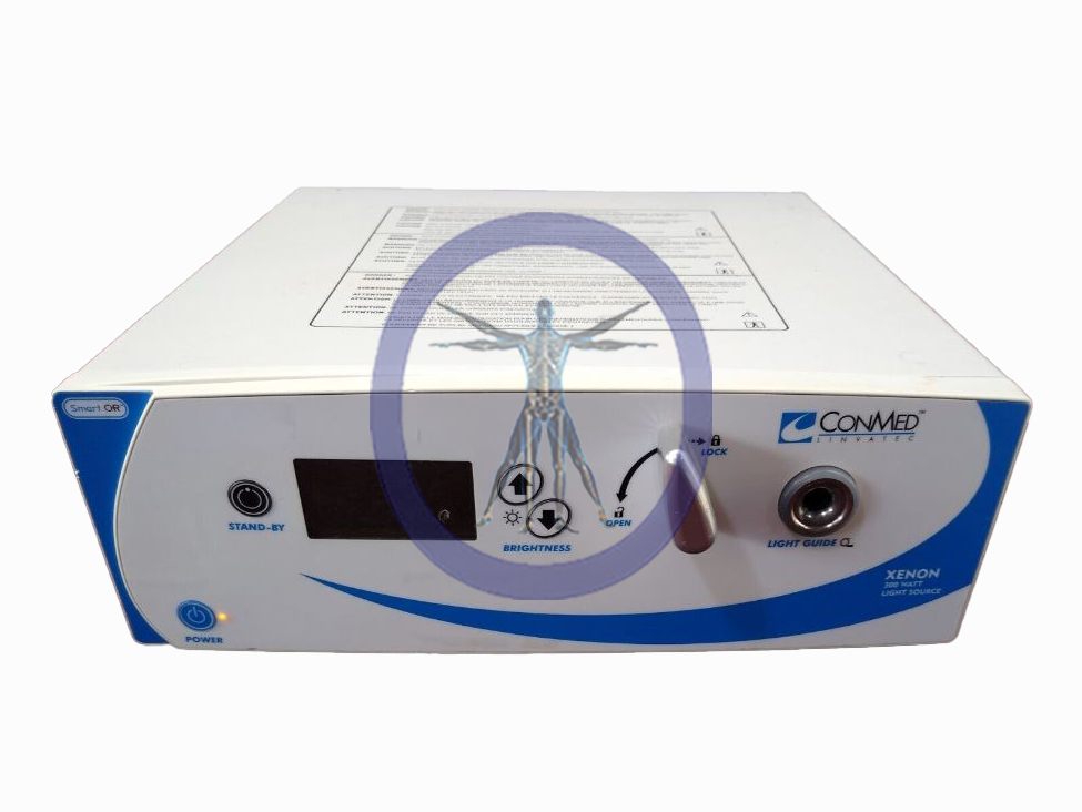 A Conmed LS7700 Light Source electrosurgical generator with buttons and a faded illustration of the vitruvian man on the front panel.