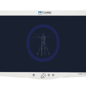 A Conmed-VP4726 26" HD Flat Panel Monitor displaying a blue-toned x-ray image of a human skeleton with arms extended, housed in a white frame with Conmed branding.
