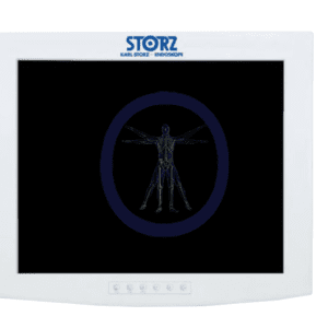 A KarlStorz-SC-SX19-A1A11 19" HD Flat Panel Monitor displaying an x-ray image of a human skeleton in standing position, encircled by a blue outline, on a black background.