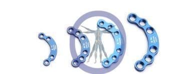 Three surgical metal plates for bone repair.