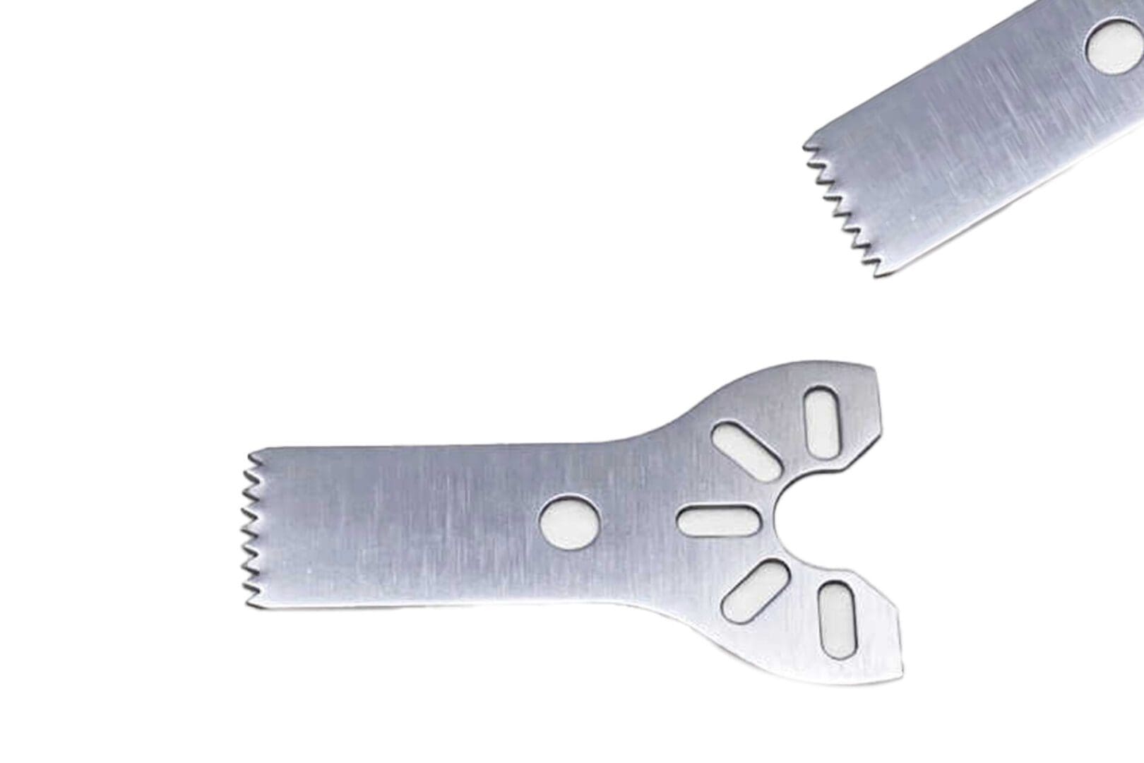 Two surgical saw blades on a white background.
