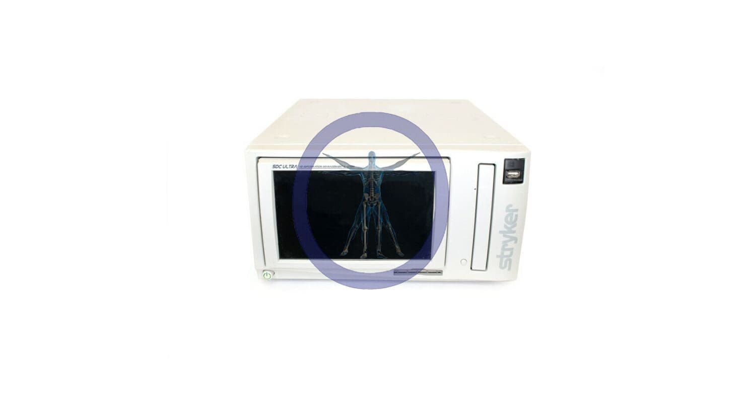 A Stryker SDC Ultra 240-050-988 Endoscopy Image Capture Unit with a blue autoclave pouch visible through its glass door, against a white background, marked by a purple circle overlay.